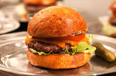 CHEESE ----- 180g ground beef, melted english cheddar, lettuce, tomato, red onion, pickles, MEAT’s sauce, brioche bun